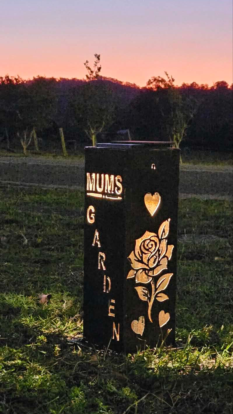 Solar Tube Corten Mums Garden